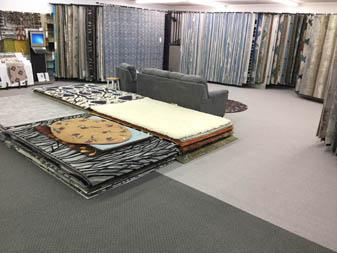 Bandele Abbey Flooring & Rug showroom area rug displays